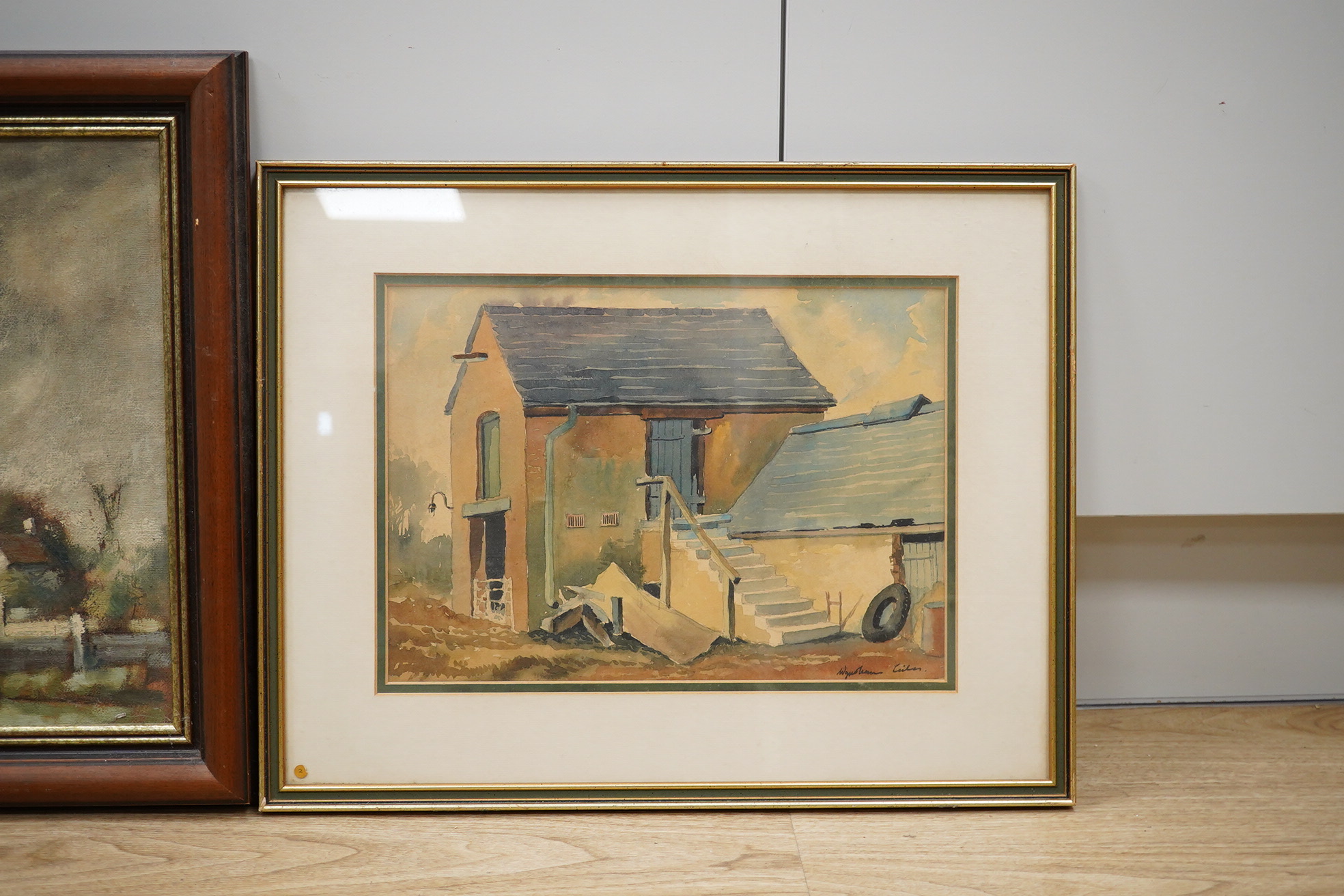 Wyndham Edwin George Giles, an oil on canvas, Stormy landscape, signed and dated ‘72, together with a watercolour by the same artist, ‘Farm Buildings, Staffordshire’, largest 34 x 39cm. Condition - fair to good